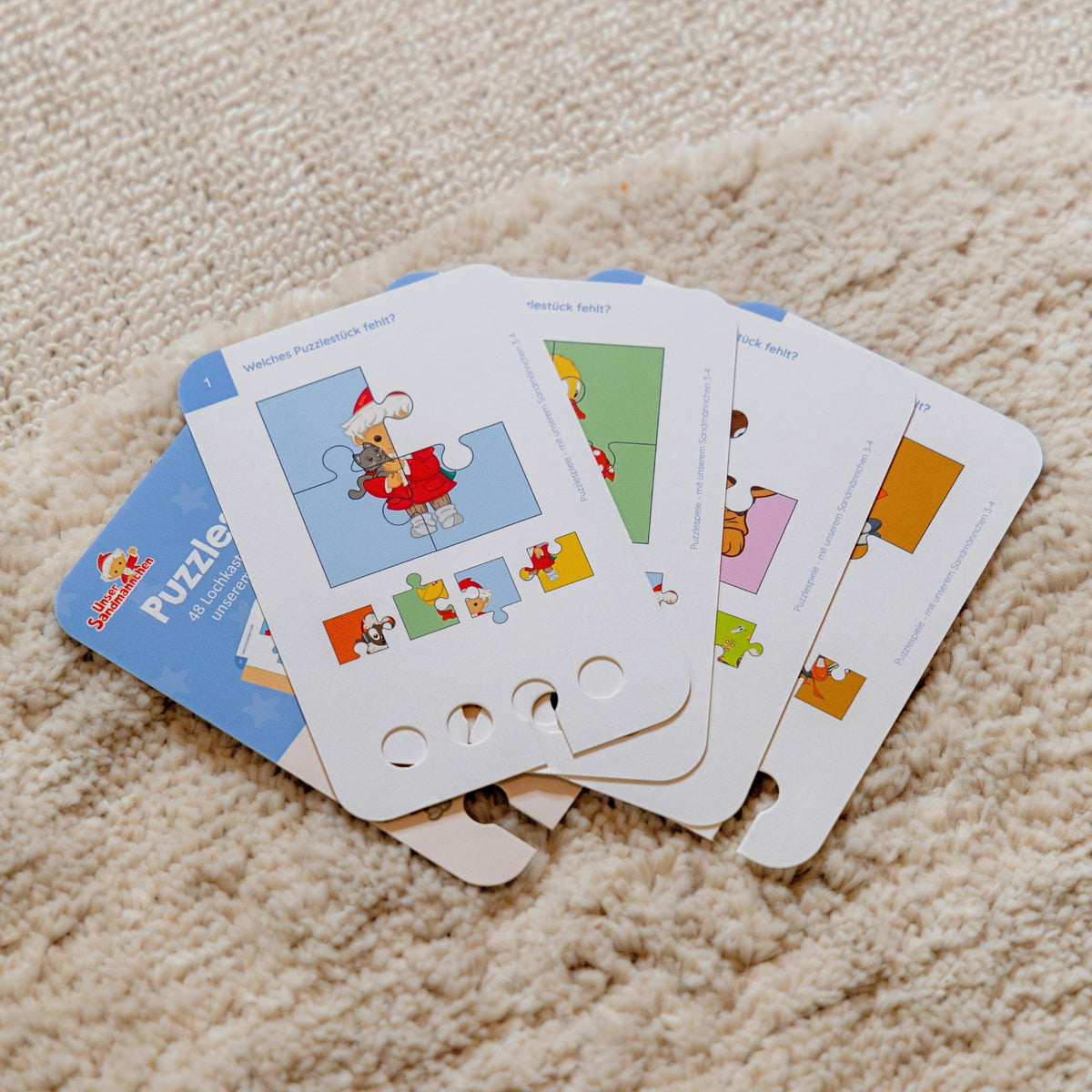 Puzzlespiele Sandmännchen ·  3-4 · Lochkasten Kartensatz